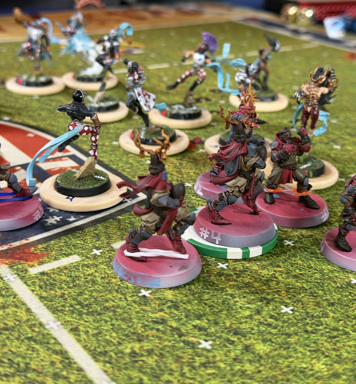 Grenadiers knights in shallow focus squaring up to the Shimmerveil Hurricanes' High Elves