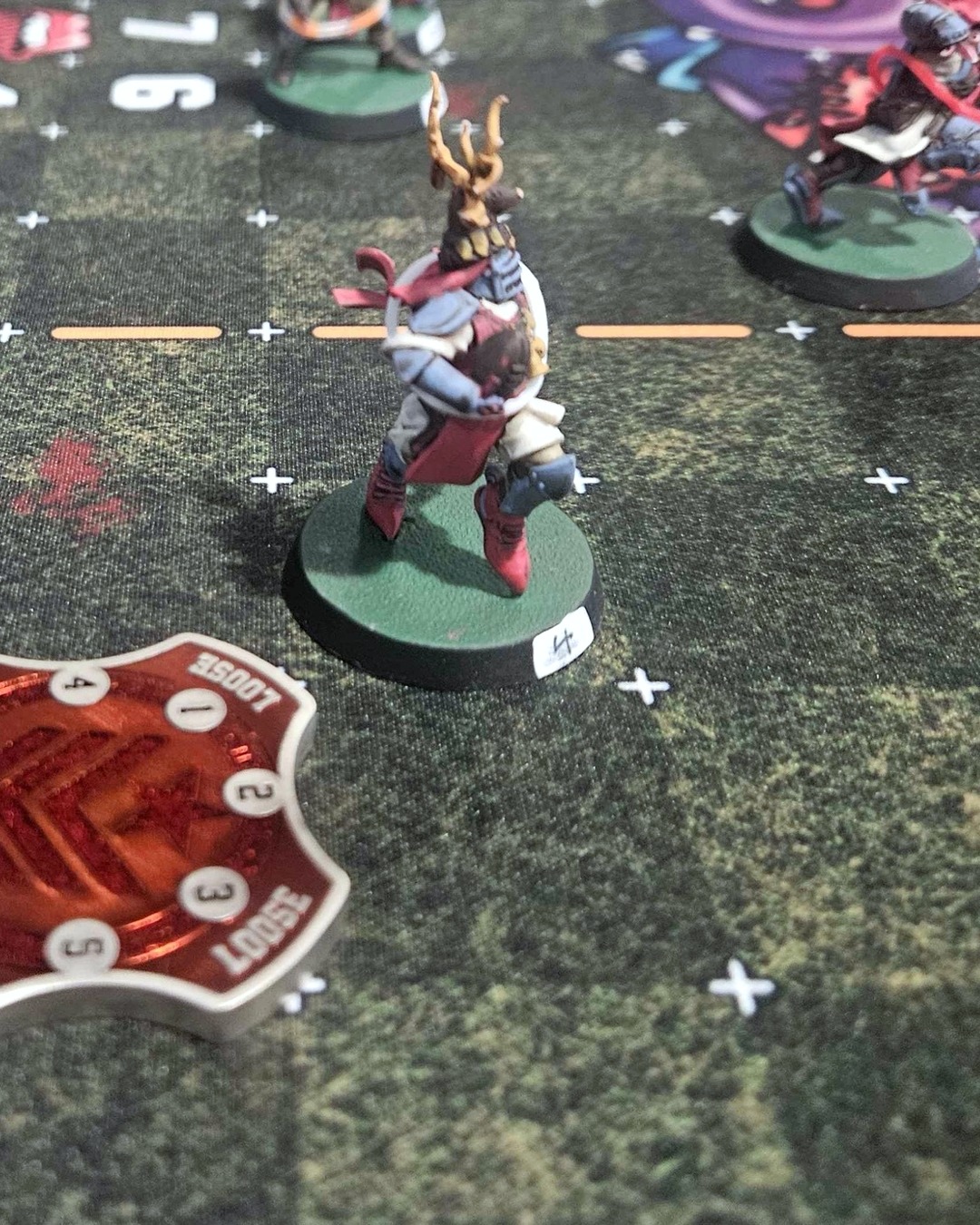 Nezot Tirasse, the antler-crested Knight Catcher, waiting near the loose ball at kickoff
