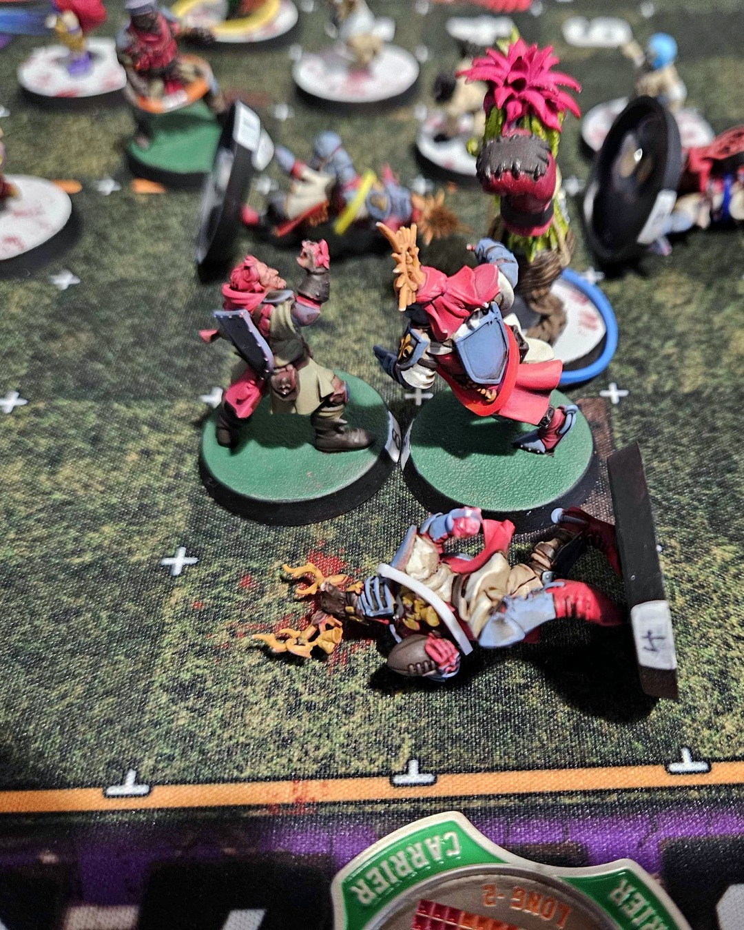 A Grenadier knight face-down after a failed dodge, the halflings closing in