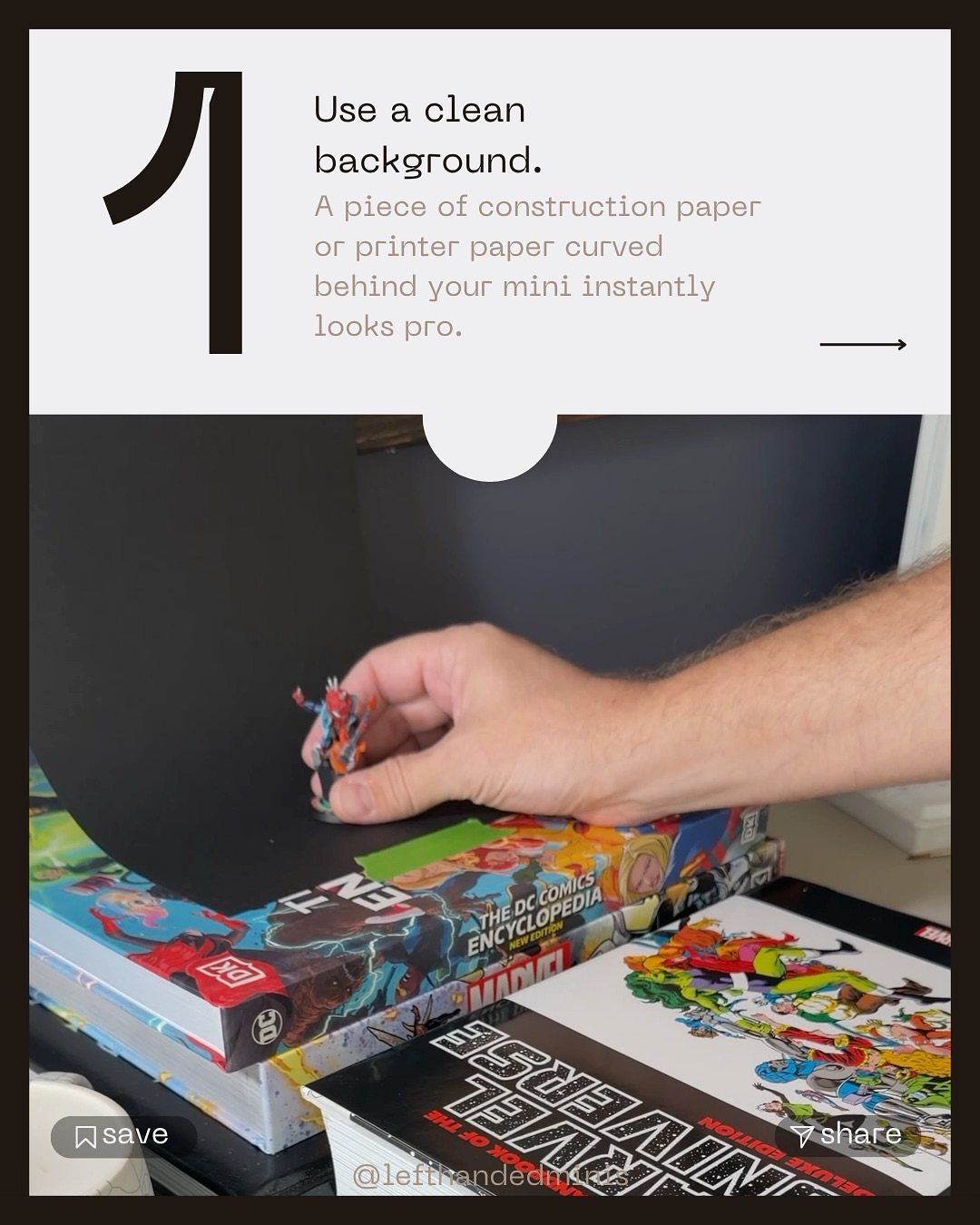 Taping a curved sheet of paper behind a mini on a stack of books