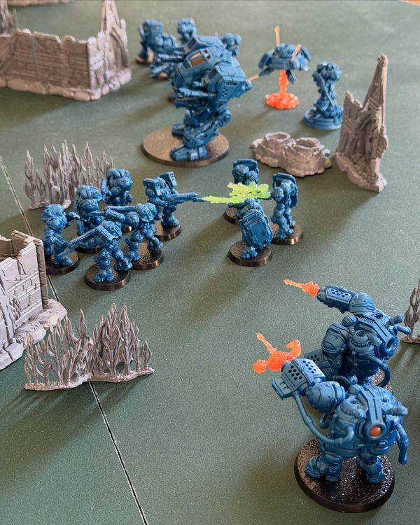 Unpainted StarCraft Terran starter set miniatures assembled on the table