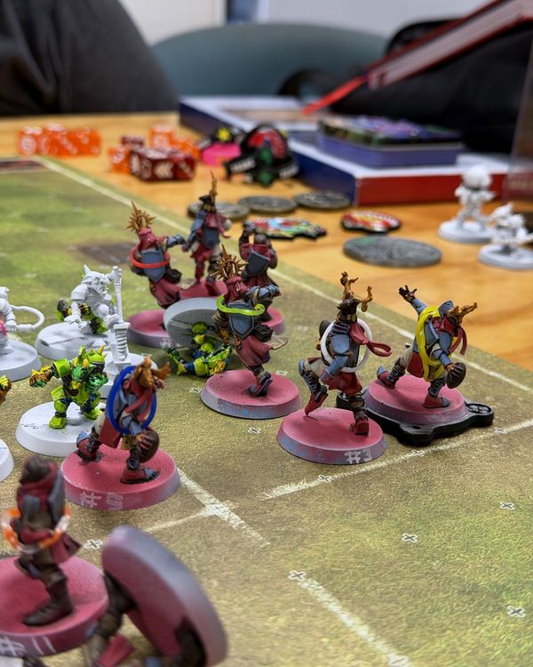 Holy Hand Grenadiers knights in shallow focus, #3 and a teammate mid-play on the pitch