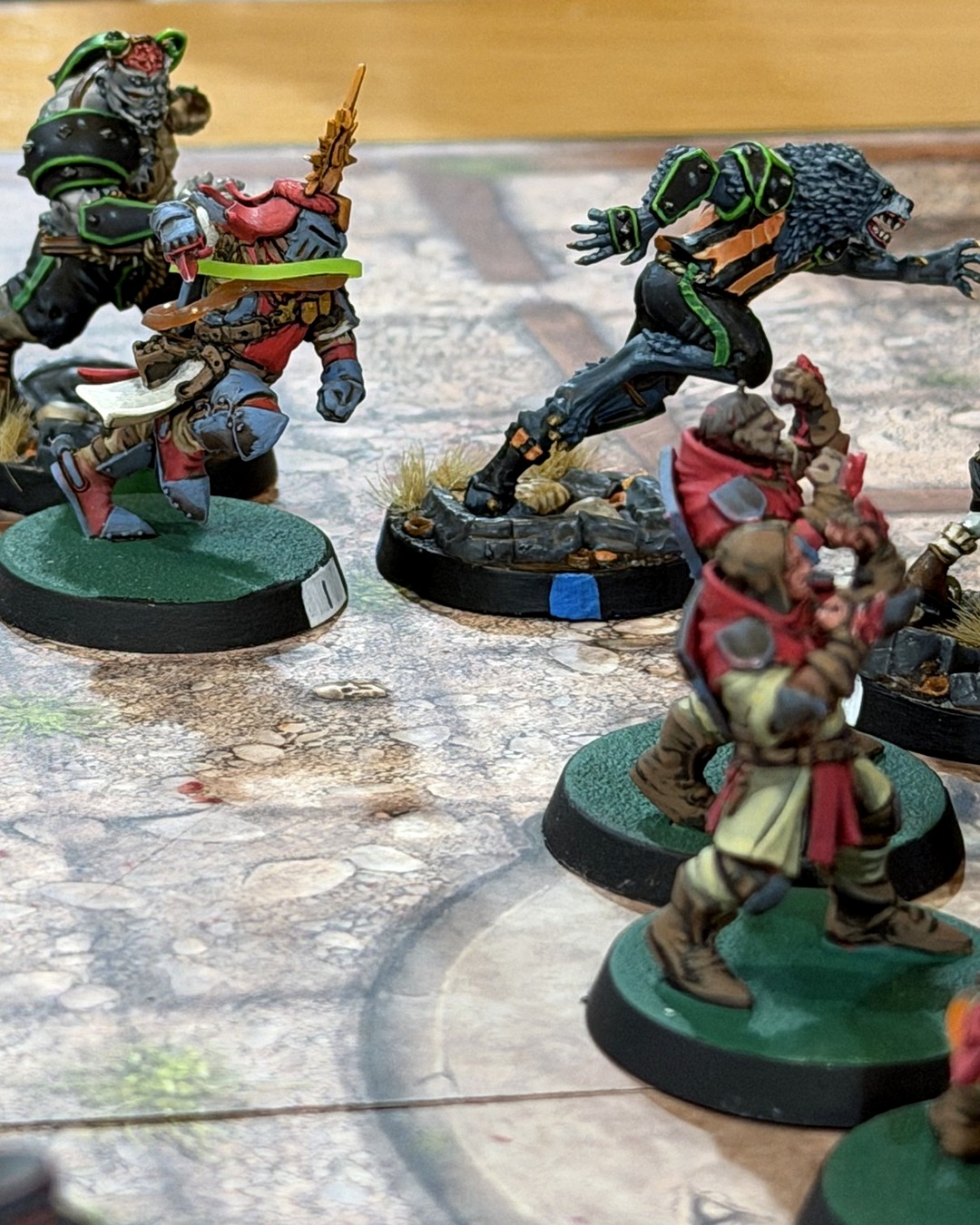 A Ghoul team Werewolf leaping past a Grenadier knight, squires and Ghouls all around