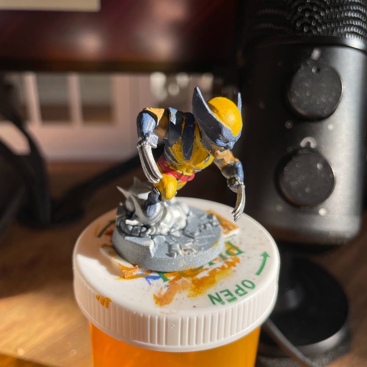 Early Wolverine on a pill bottle handle